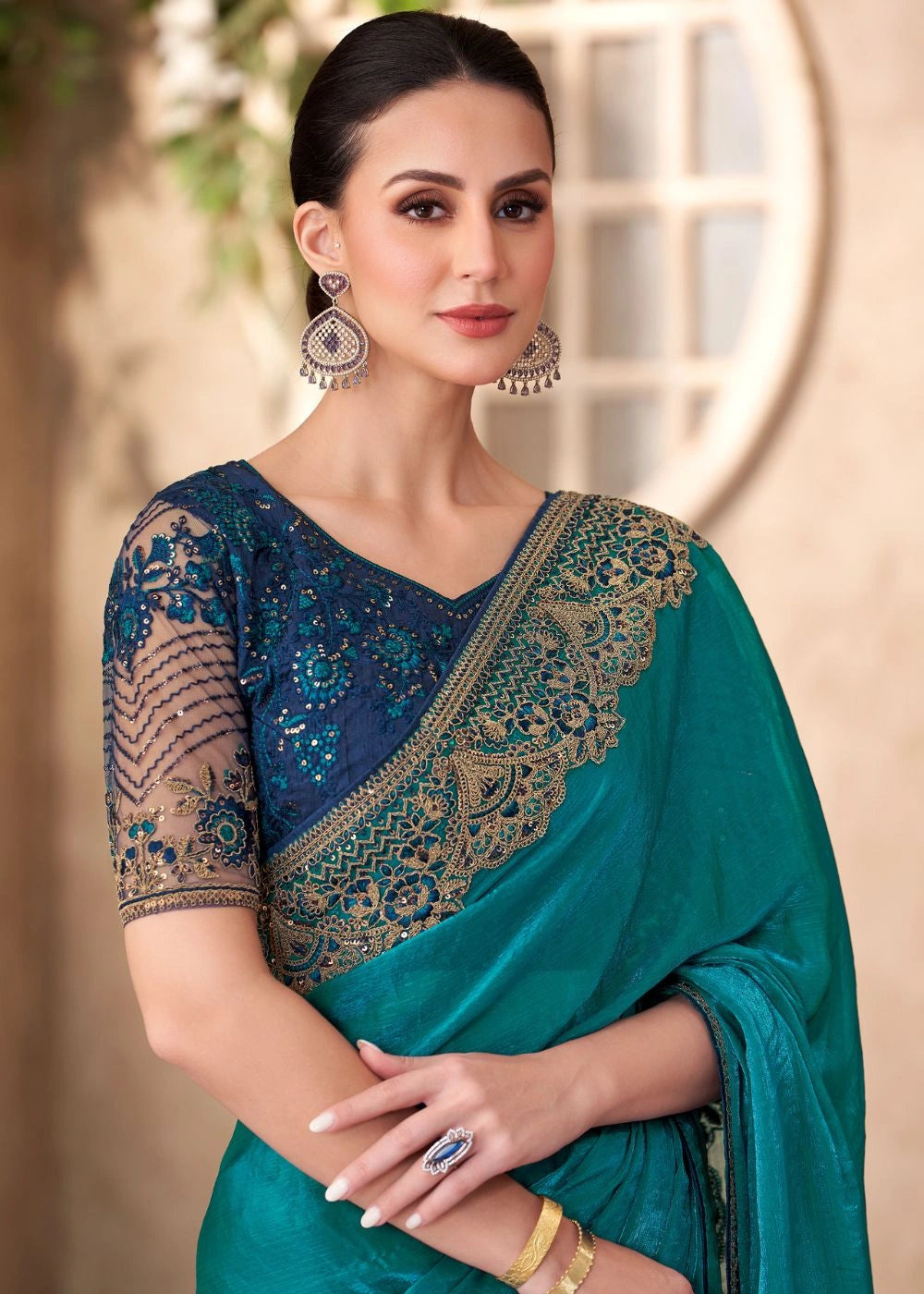 Teal Blue Satin Chiffon Saree with Rich Embroidered Border