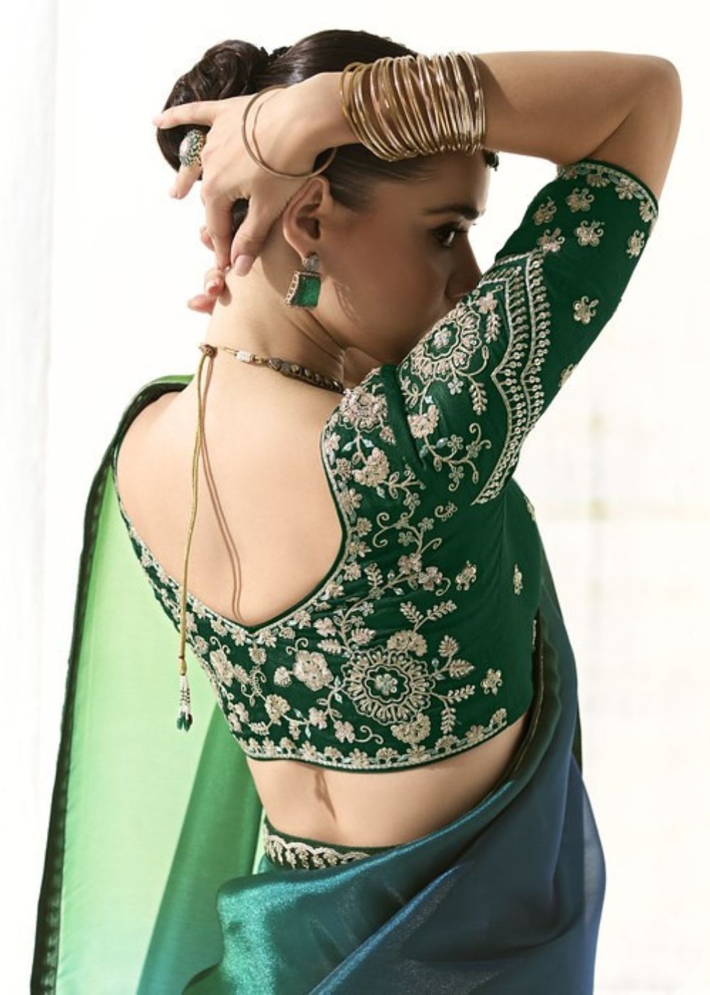 Neelambara-Teal Green Organza Tissue with Heavy Butta & Border Silk Saree