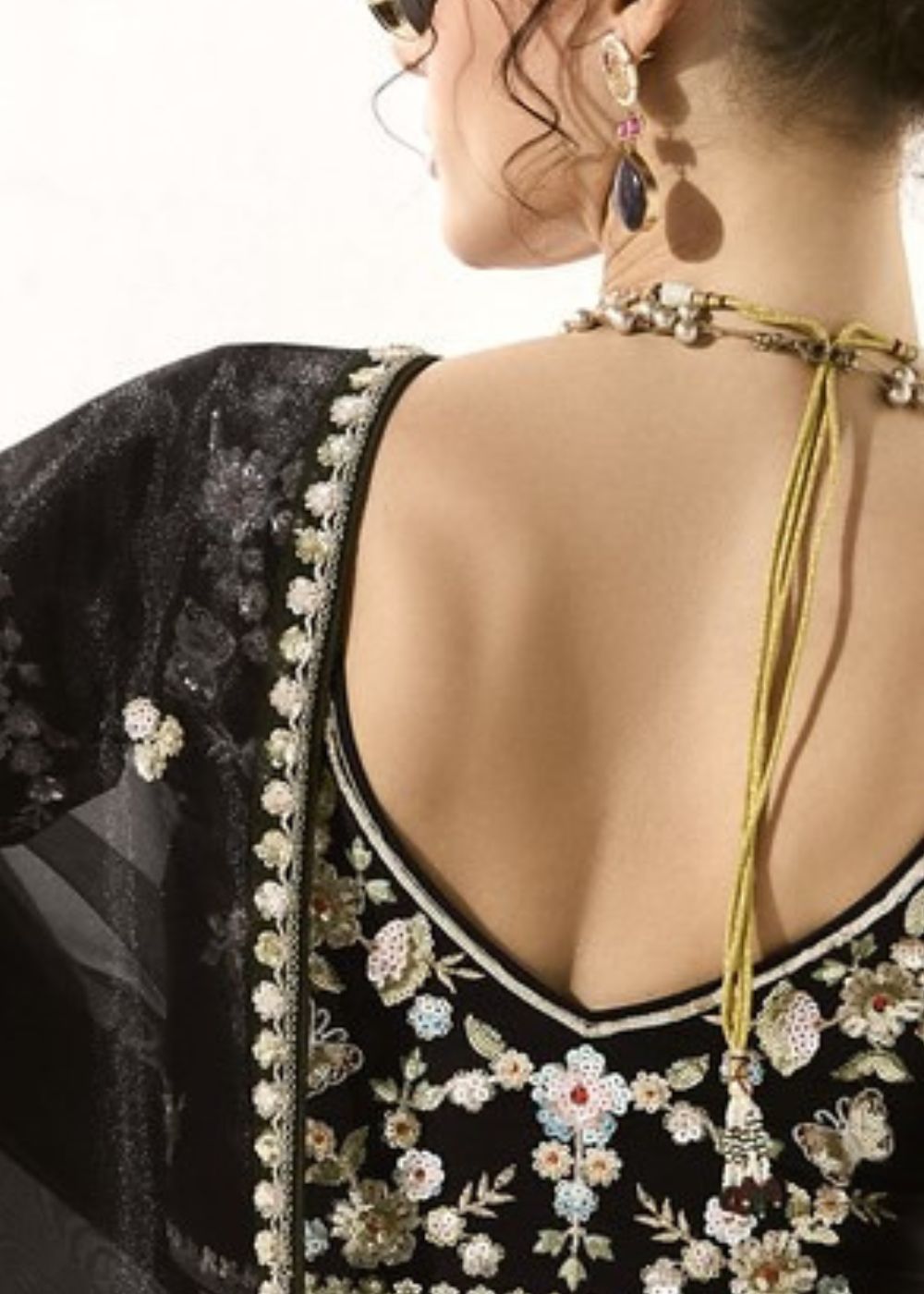 Krishna Ratri-Midnight black elegance adorned with golden buttas organza tissue saree
