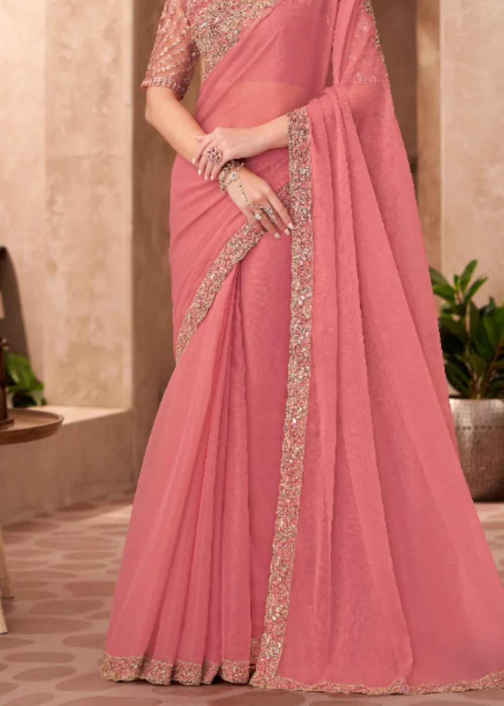 Peach Georgette saree with Heavy Lace Detailing