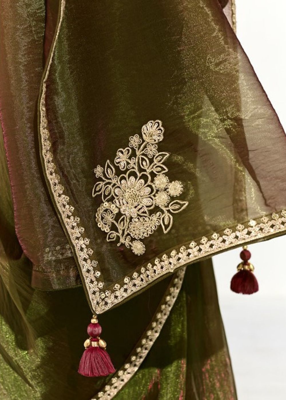 Harit Vastra – Olive Green Organza Tissue Saree with Butta Work