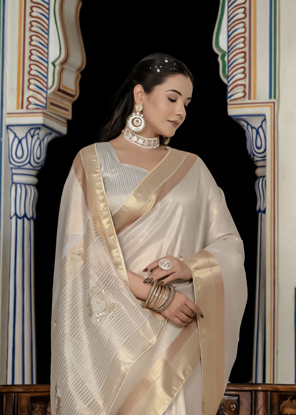 Regal Moonshine Woven Tissue Linen Saree with Dual Zari Patta & Khatli Hand Embroidery