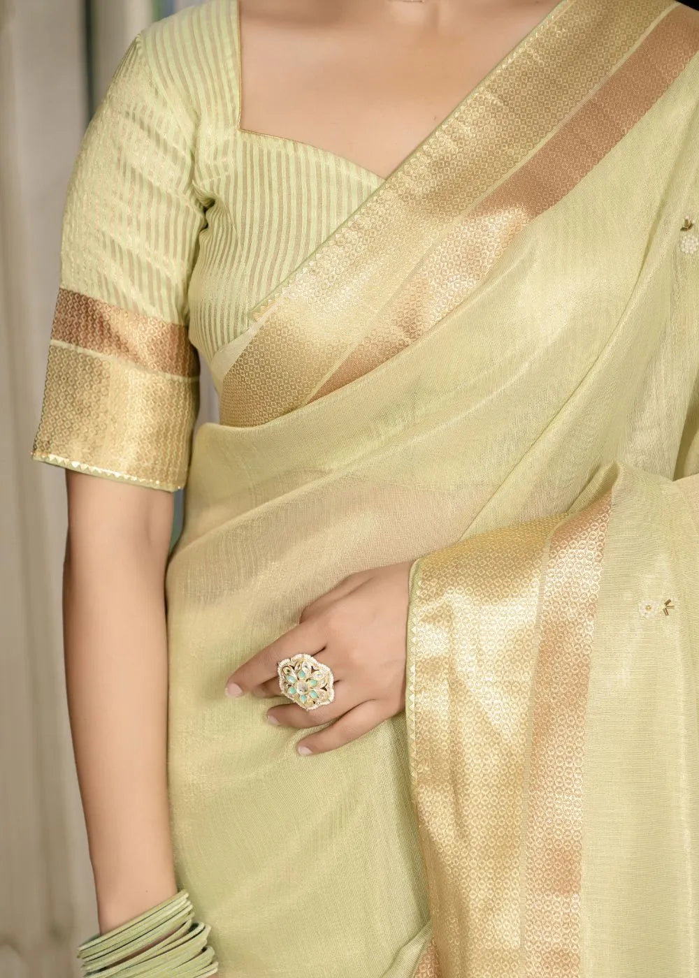 Pistachio Grace Tissue Linen Saree with Zari Patta and Signature Khatli Details