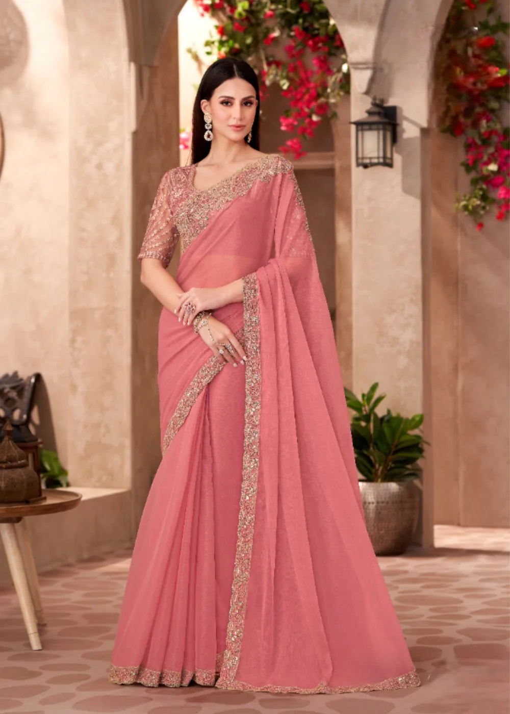 Peach Georgette saree with Heavy Lace Detailing