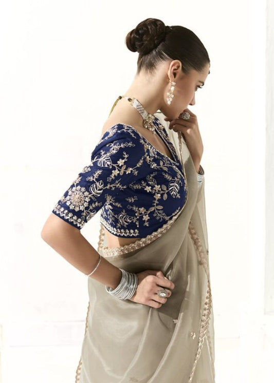 Chandrika-Soft ivory with a hint of shimmer organza silk saree