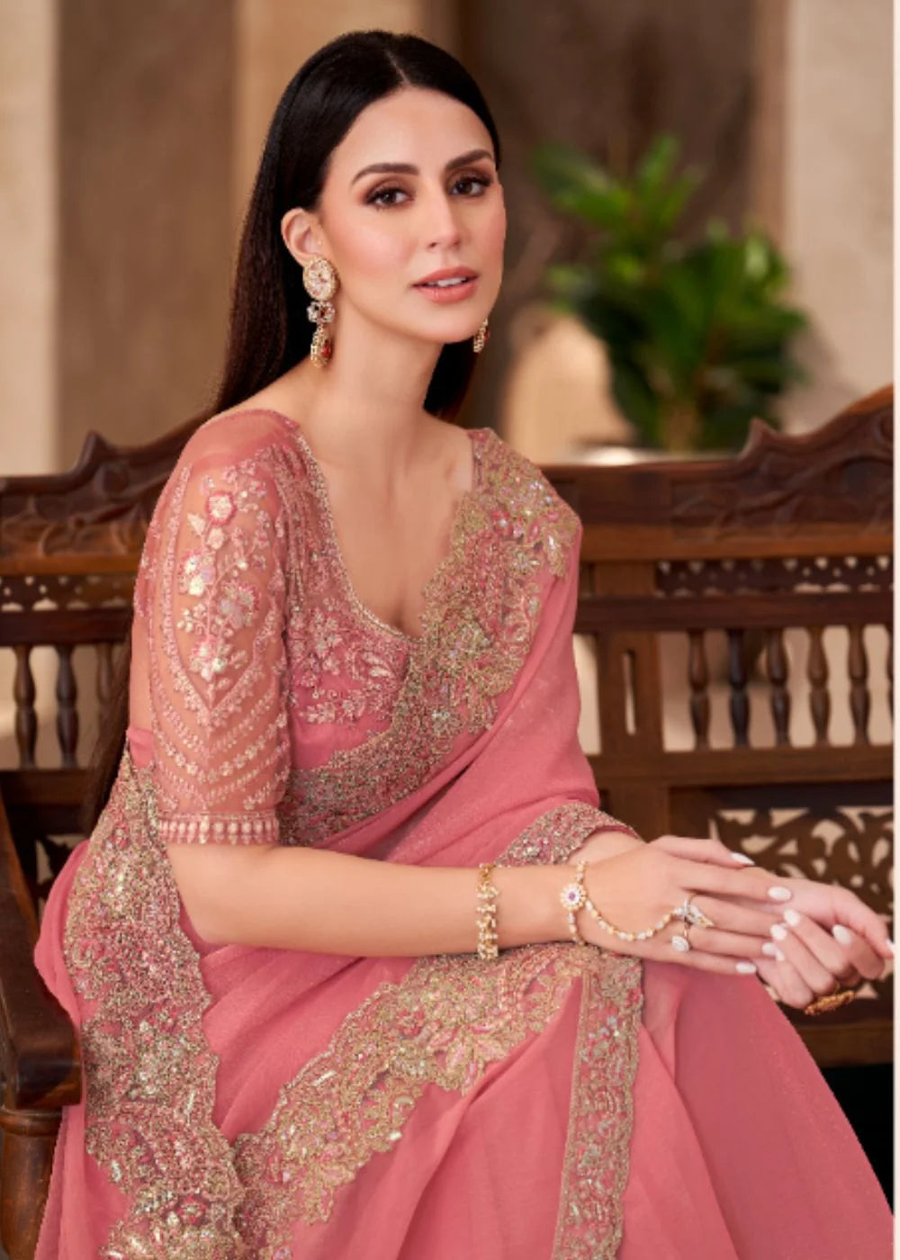 Peach Georgette saree with Heavy Lace Detailing