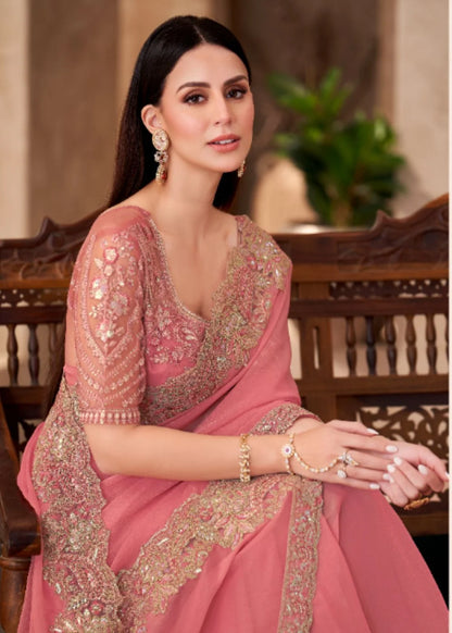 Peach Georgette saree with Heavy Lace Detailing