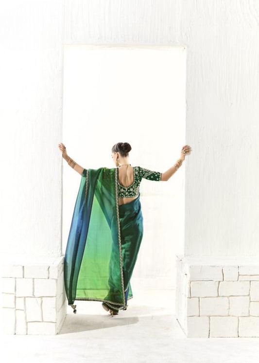 Neelambara-Teal Green Organza Tissue with Heavy Butta & Border Silk Saree