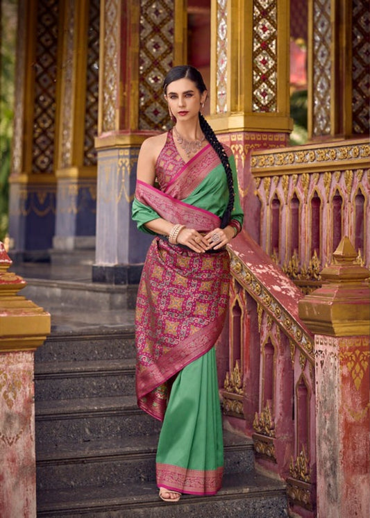 Varnika Bottle Green Silk Saree with Pink Zari Contrast Border