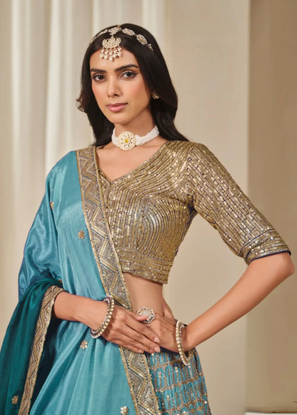 Oceanic Aura – Aqua Blue Chinon Silk Lehenga with Radiant Golden Weaves